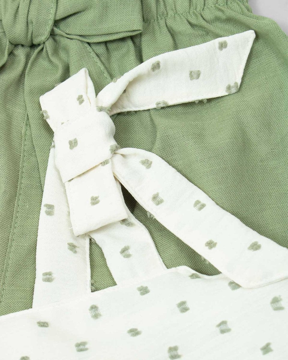 Conjunto blusa de tiras blanca de puntos verdes y short verde con moño –  Cielito