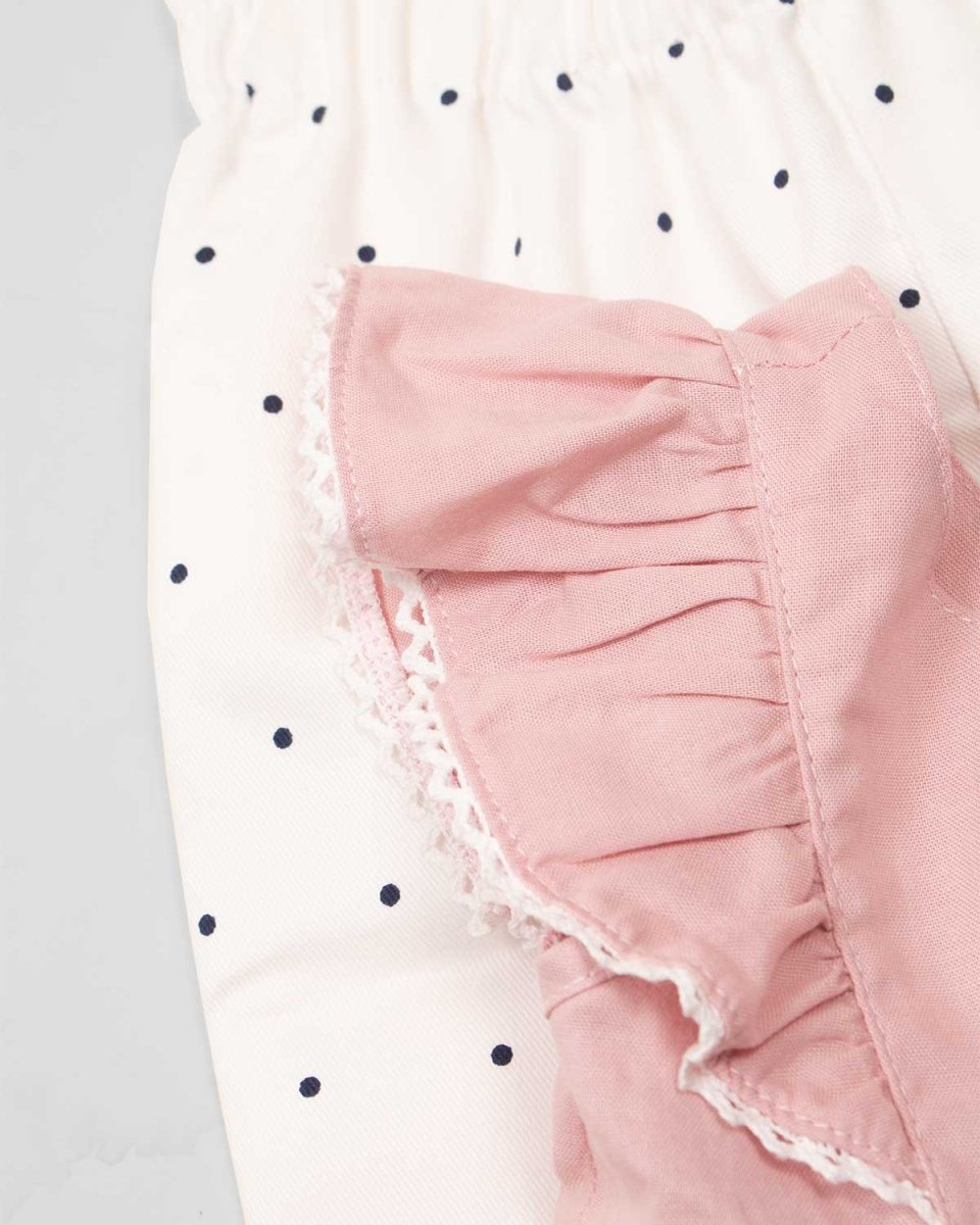 Conjunto blusa rosada con boleros, moño y pantalón blanco con puntos para bebe niña - Cielito