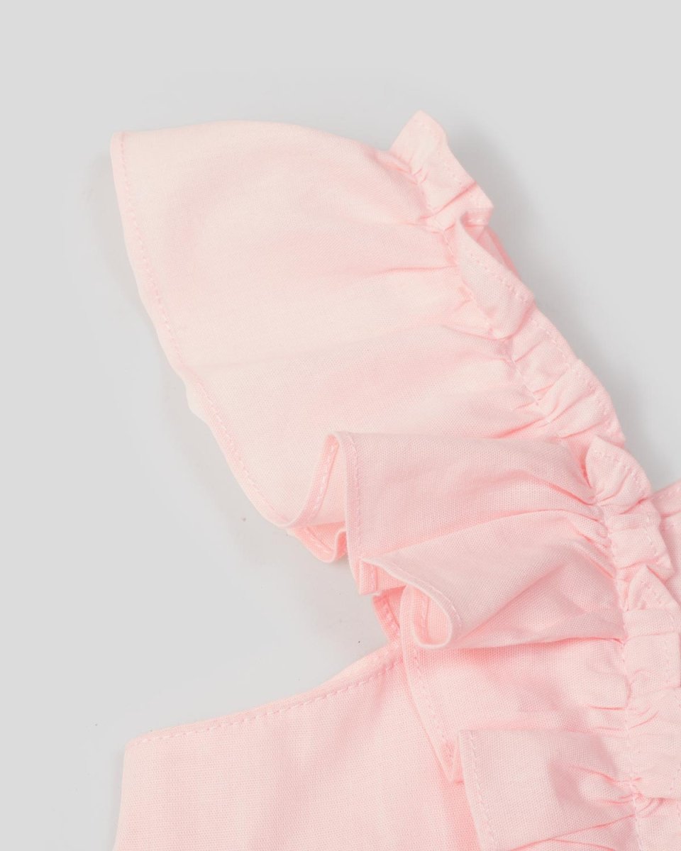 Conjunto blusa rosada de tiras, botonadura en costado y short estampado para niña - Cielito