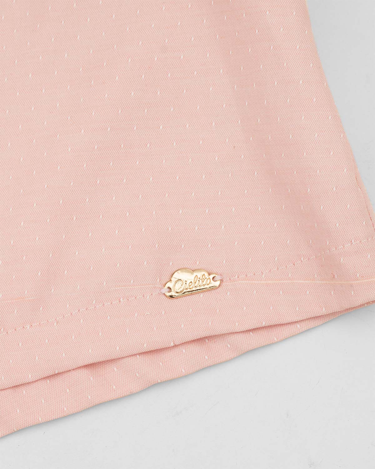 Blusa palo de rosa con boleros y botonadura en espalda para niña