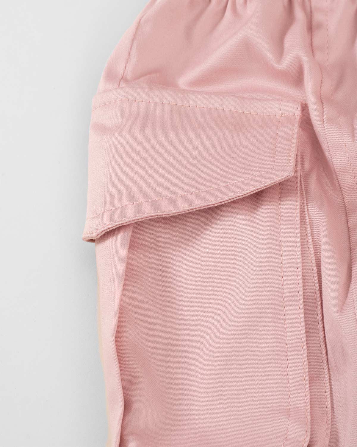 Falda palo de rosa tipo cargo para niña