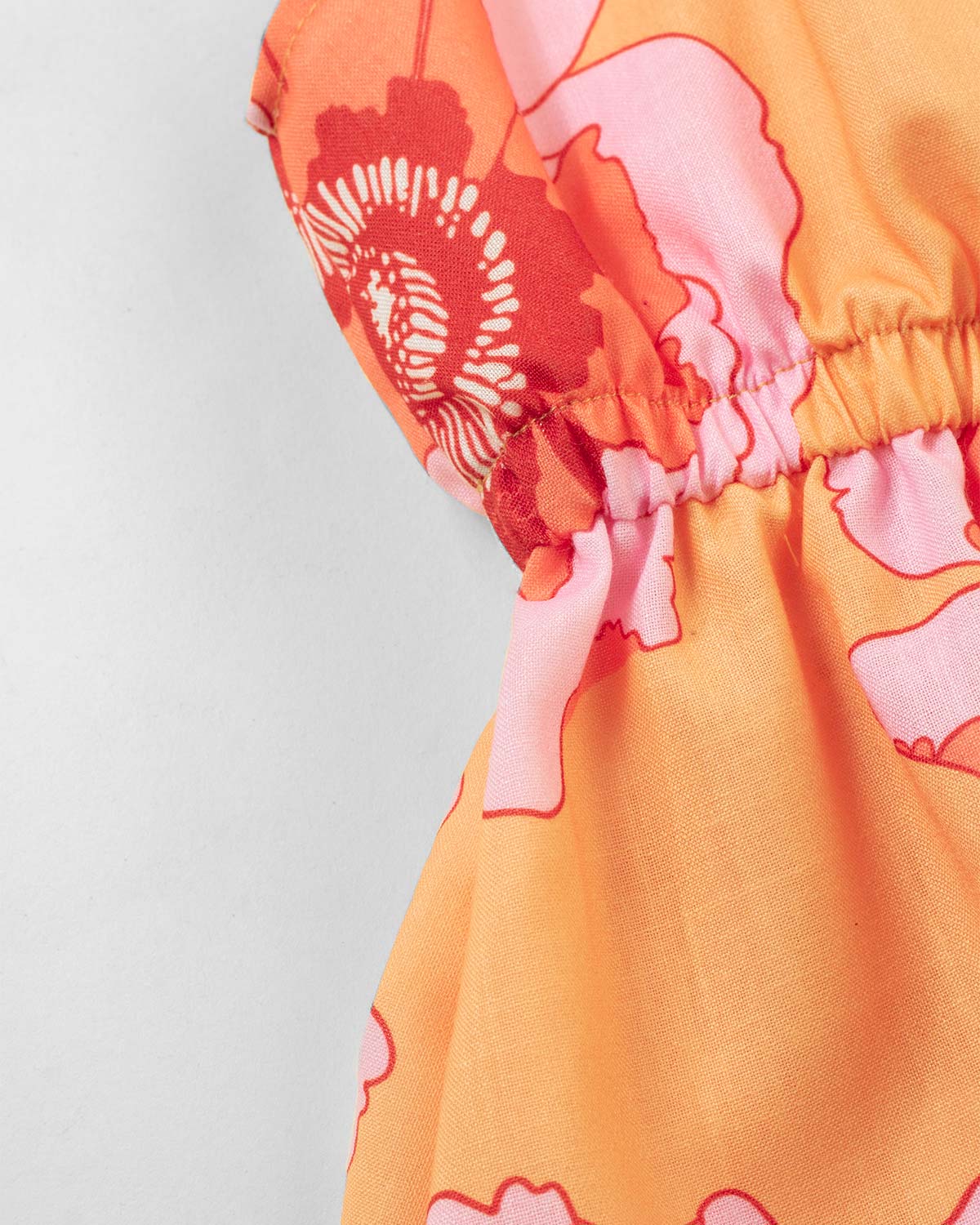 Vestido flores naranjas con moño en tiras