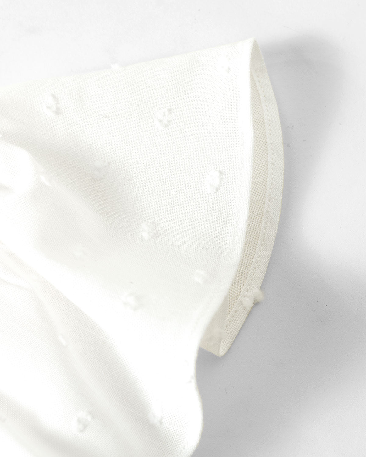Blusa blanca con boleros y moño para niña