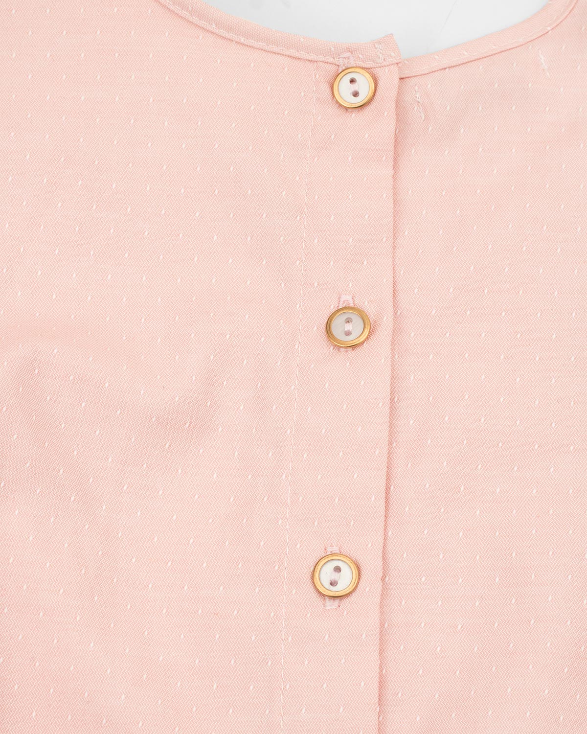 Blusa palo de rosa con boleros y botonadura en espalda para niña