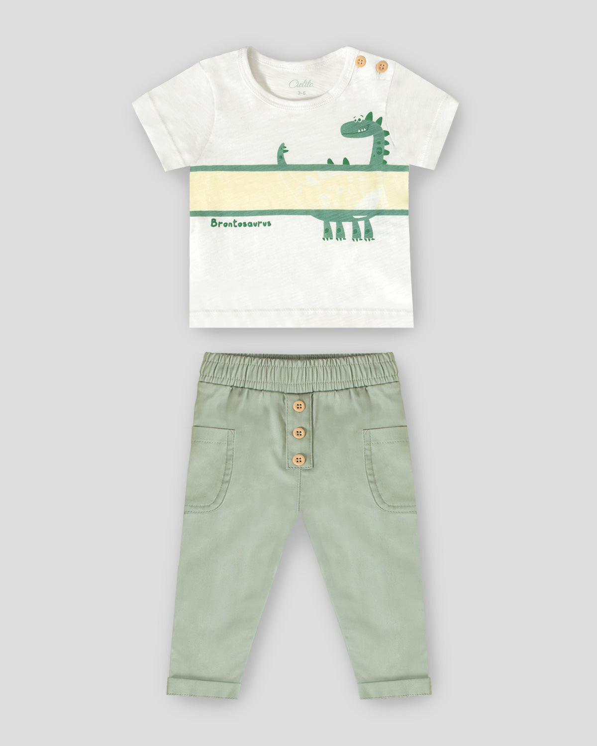Conjunto camiseta dino y pantalón verde con botones de madera para bebé niño