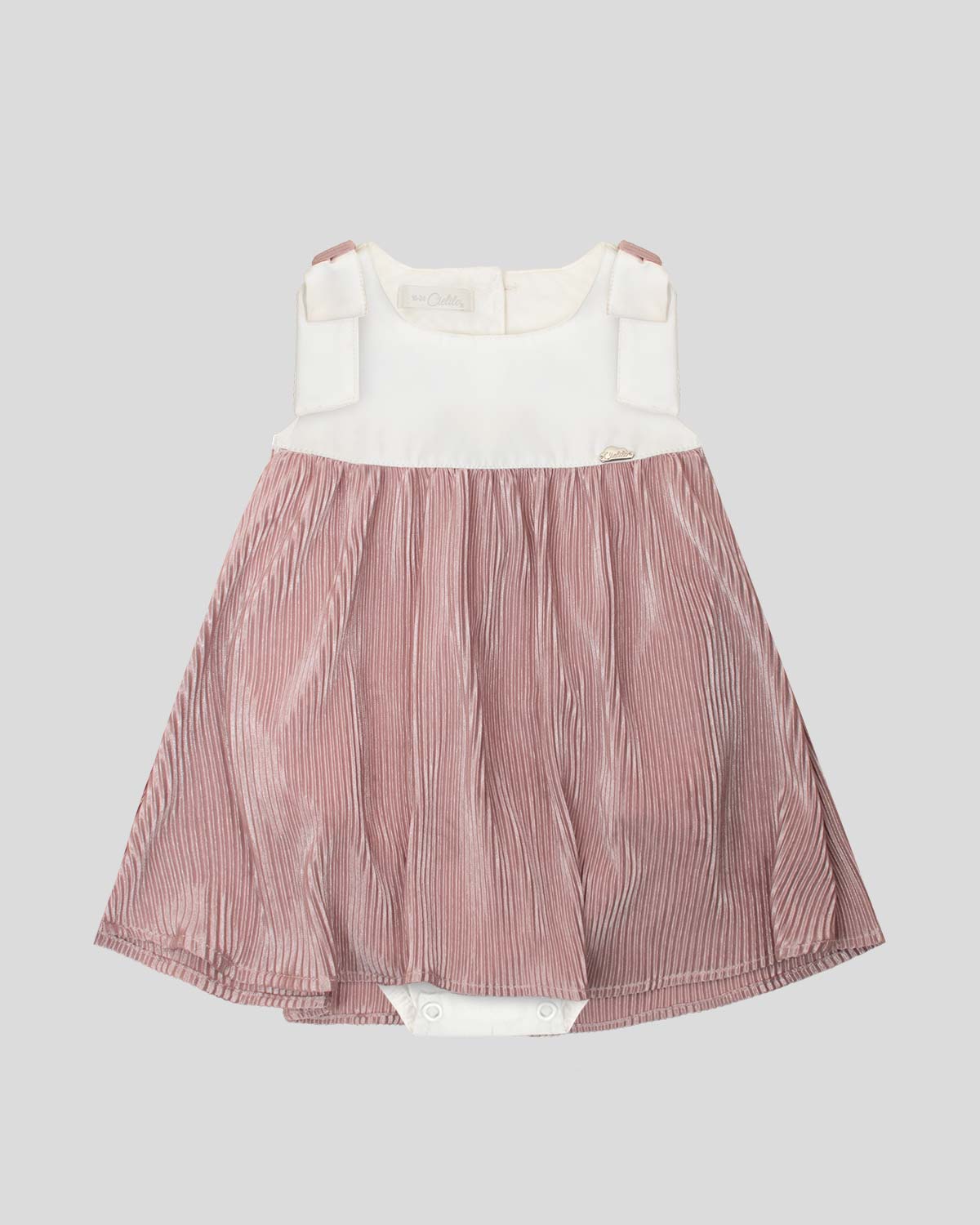 Vestido body blanco y palo de rosa en tela plisada con moño para bebé niña
