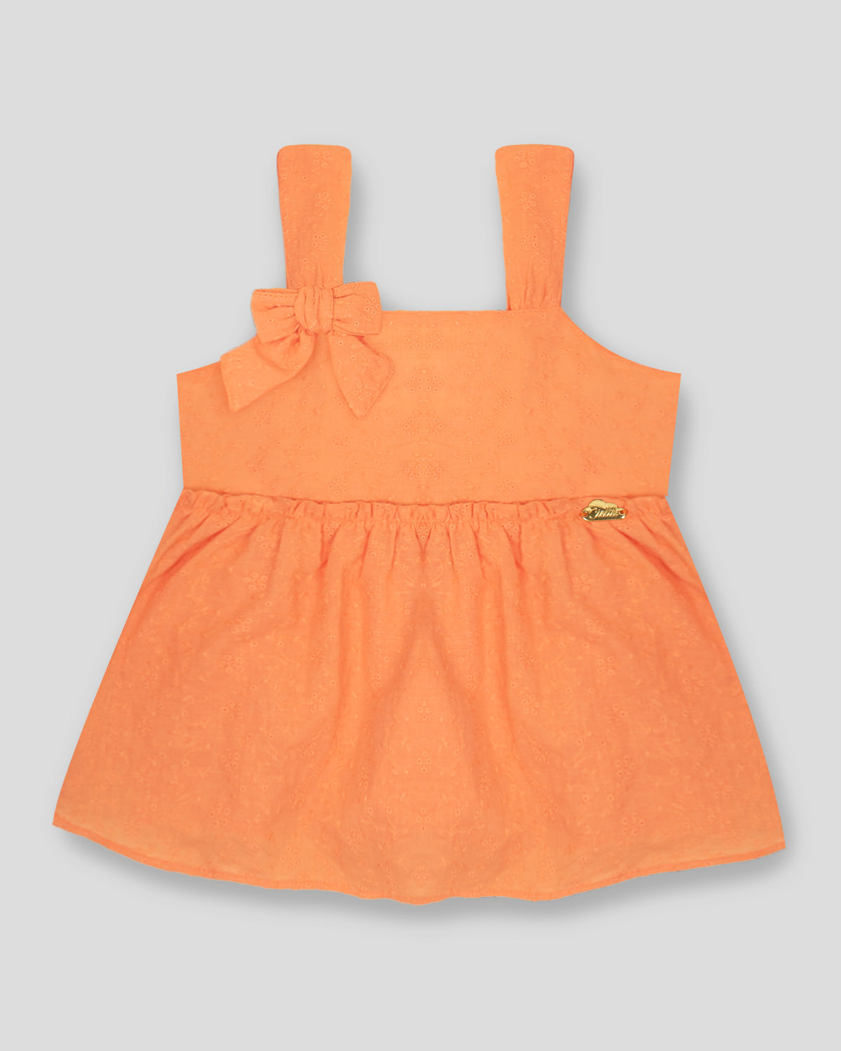 Blusa de tiras naranja con moño para niña