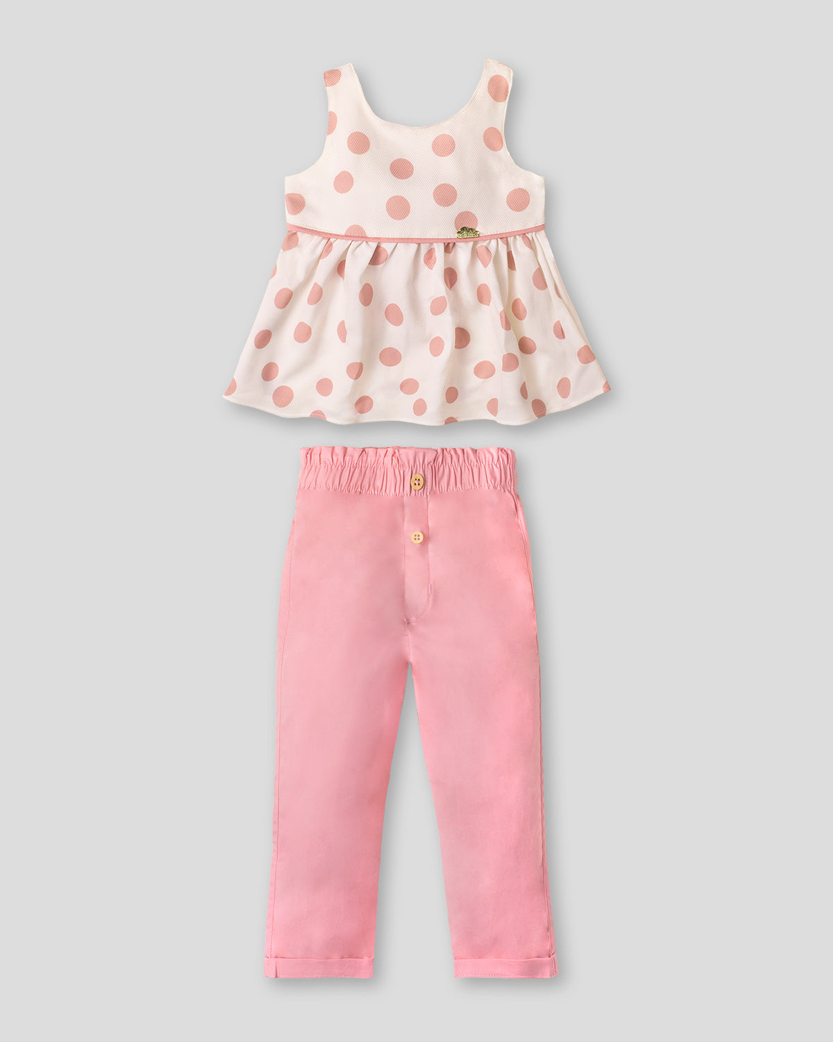 Conjunto blusa de lunares con moño en espalda y pantalon palo de rosa para bebé niña