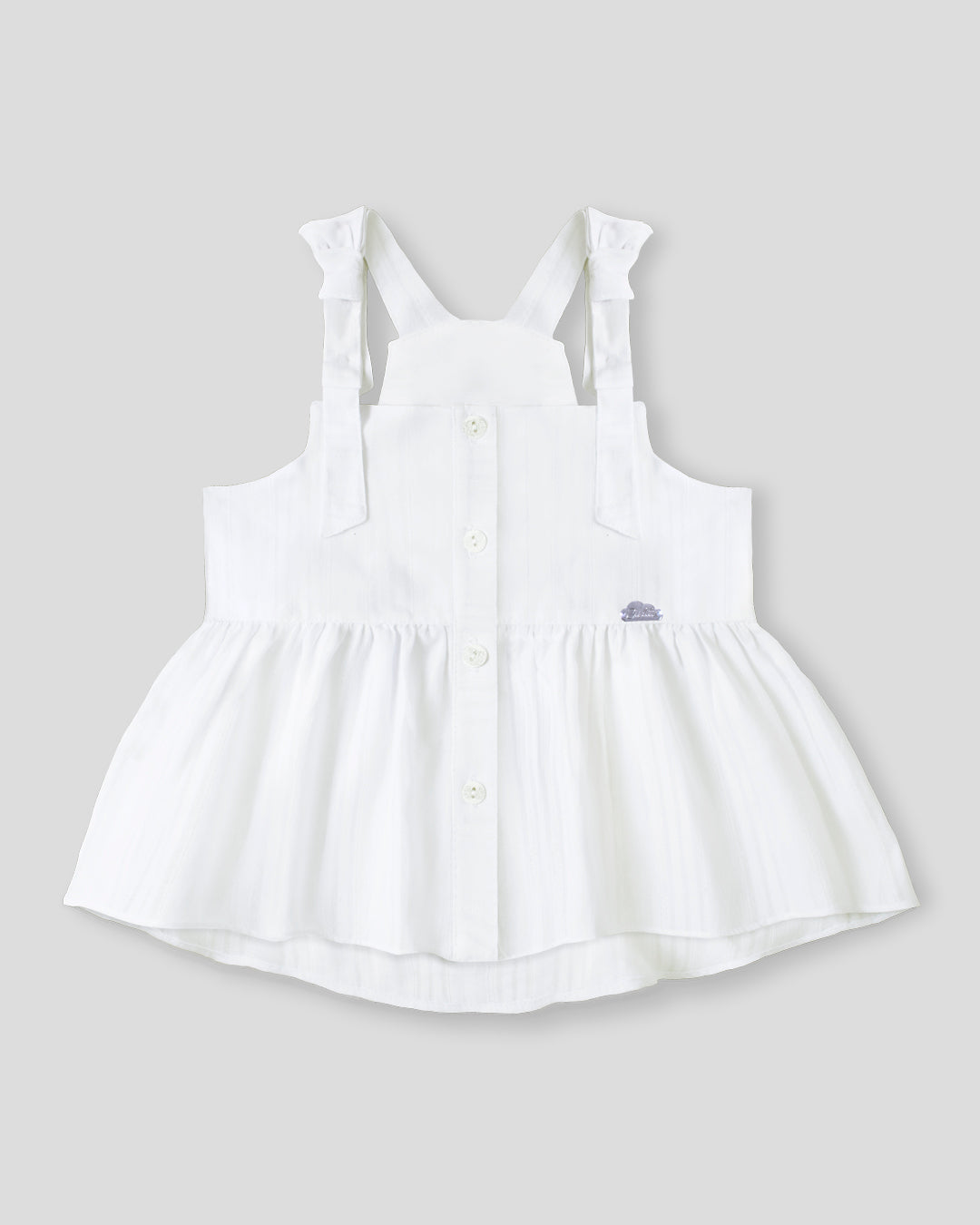 Blusa blanca con detalle de hilo metalizado para niña